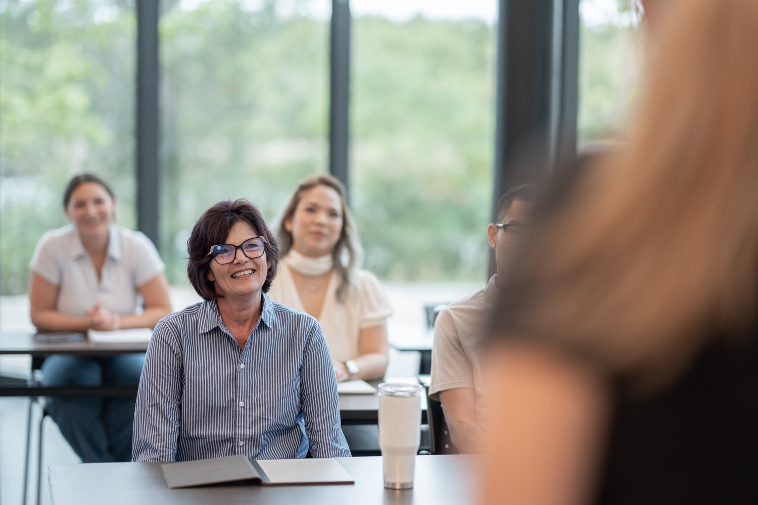 Smiling learners in a bright classroom