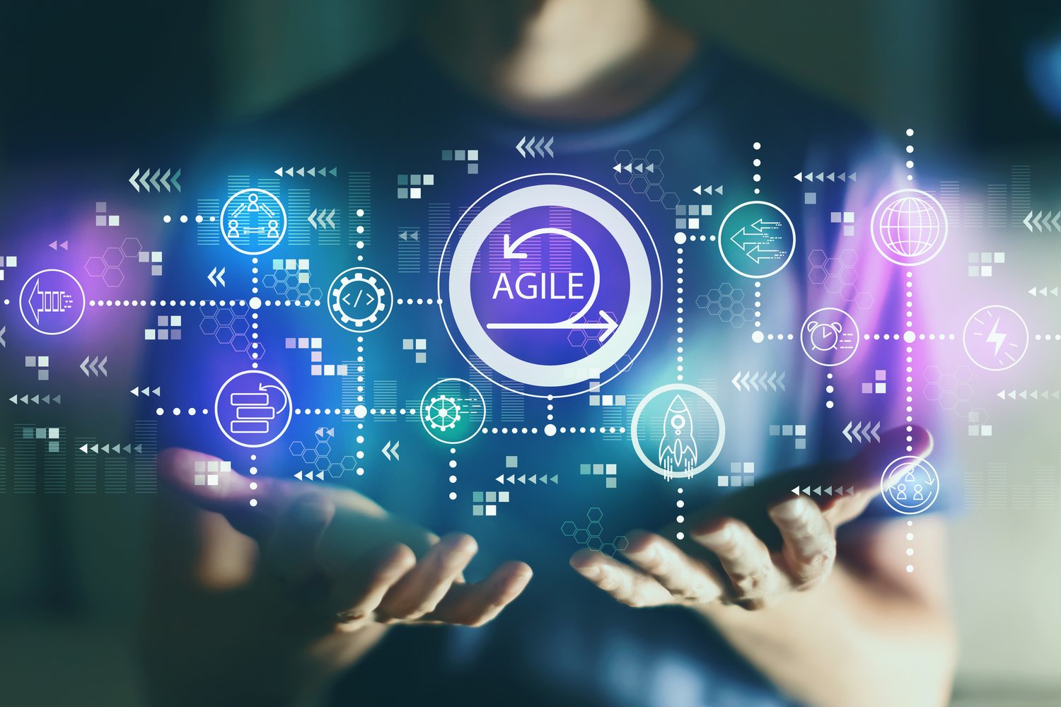 Agile workflow icons over open hands